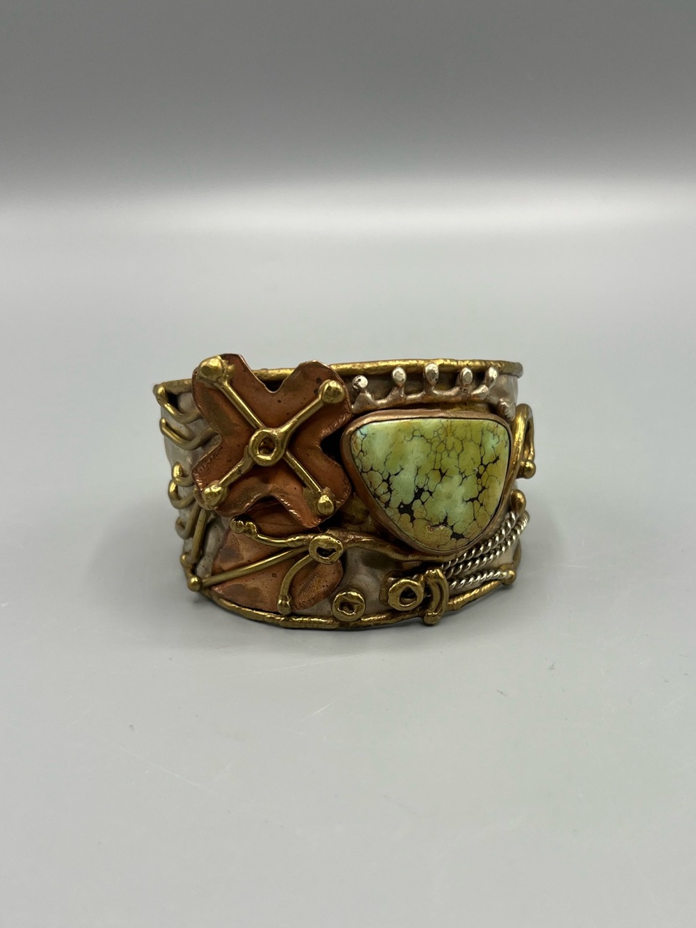 Mixed Metal Cuff Bracelet Gold Silver Tones with Green Bezel-Set Stone